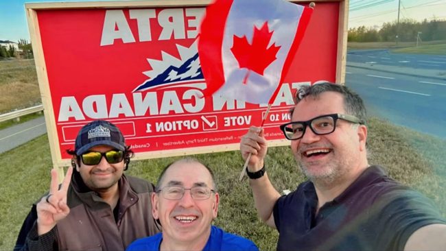 Volunteers together with a Canadian flag